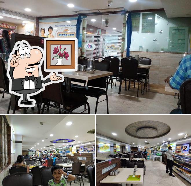 Take a seat at one of the tables at Adyar Ananda Bhavan - A2B