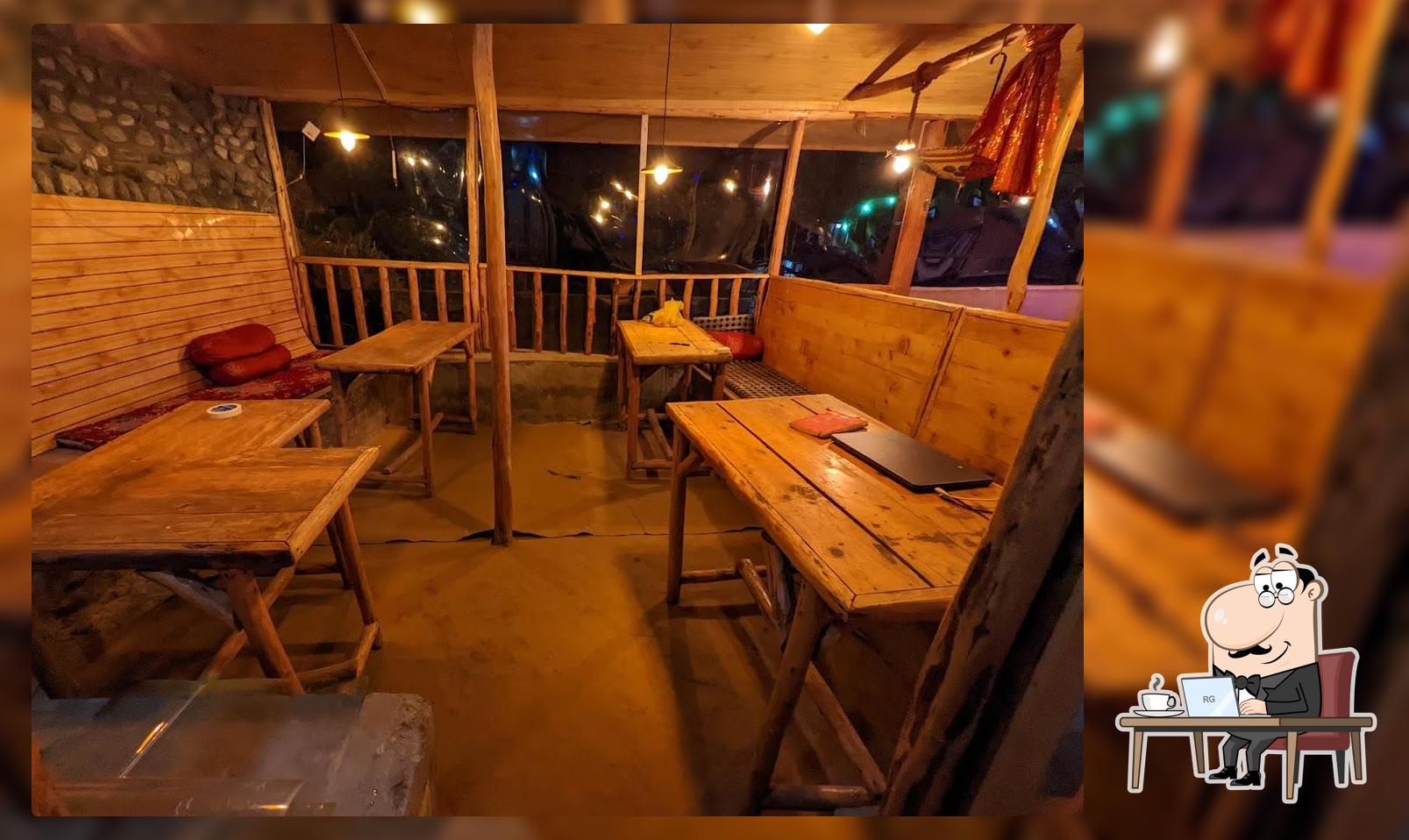 Take a seat at one of the tables at The Detox Cafe