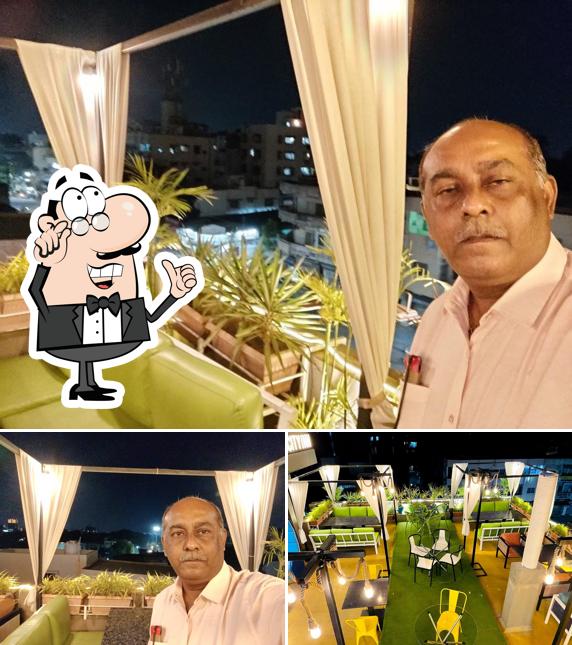 Take a seat at one of the tables at Chef's Kitchen Mavdi