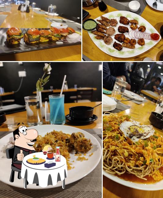 Get a burger at The G.O.A.T Restaurant