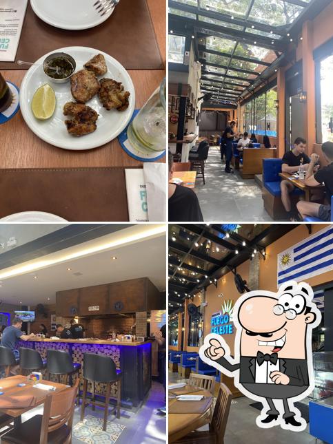 Sente em uma das mesas no Parrillada Fuego Celeste - Unidade Pinheiros