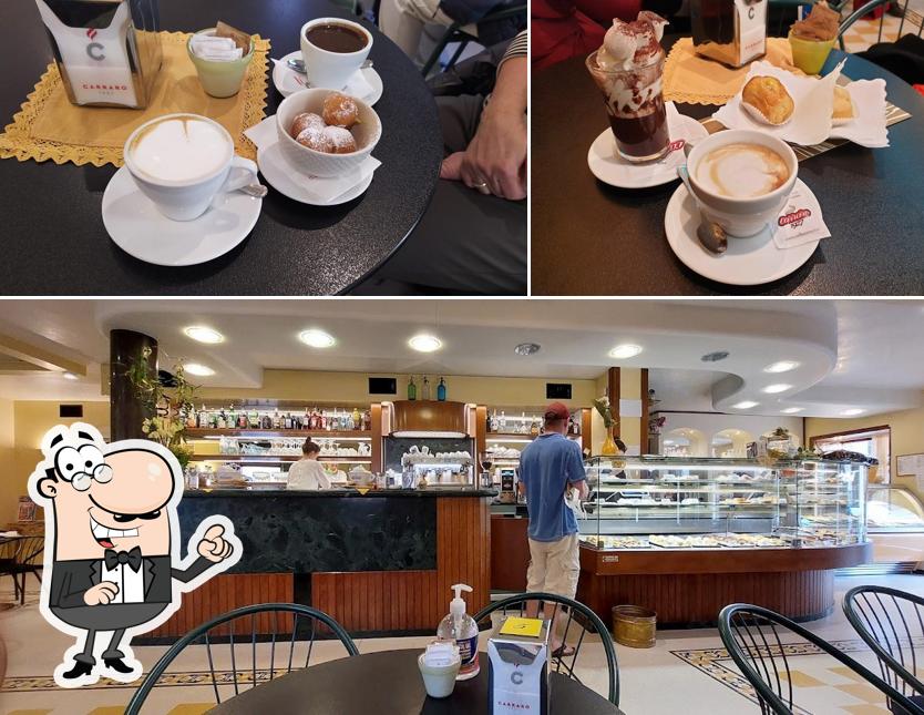 Guarda la immagine che raffigura la interni e cibo di Pasticceria Signorini Di L.P. Sas