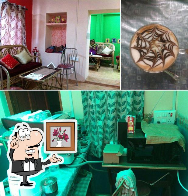 Take a look at the picture showing interior and beverage at The place Ngo Outlet cafe