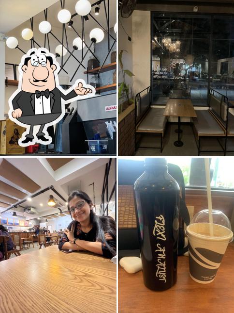 Take a seat at one of the tables at Third Wave Coffee