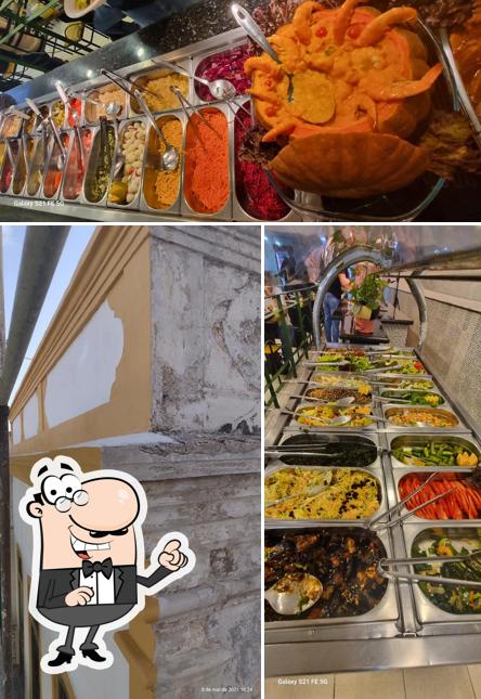 Dê uma olhada a ilustração mostrando interior e comida no Restaurante Manga Rosa Self Service Praça do Carmo Recife