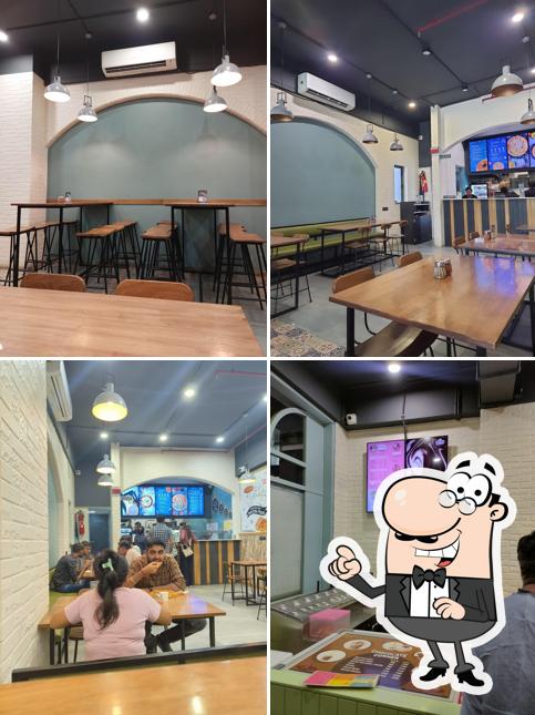 Take a seat at one of the tables at RP's Pizzeria