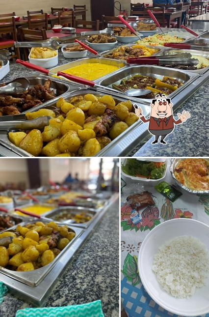 Entre diferentes coisas, comida e interior podem ser encontrados no Lígia Refeições Vila Matilde