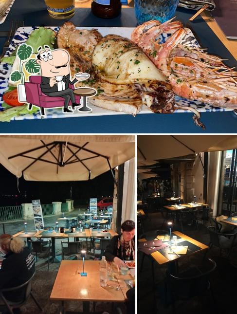 La immagine di interni e cibo da Pindaro - Ristorante & Bistrot