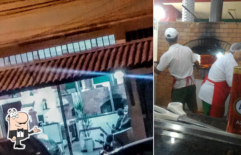 O interior do PIZZARIA CARMELLA THOMEU