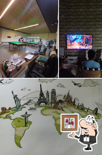 This is the picture depicting interior and food at HIGH SCORE DEN SNOOKER CLUB & CAFE