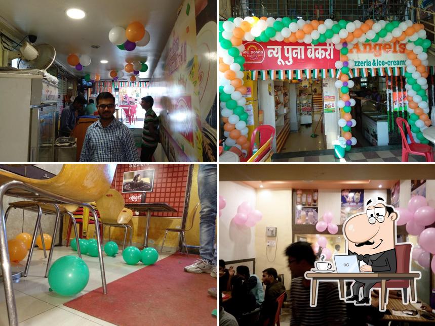 Take a seat at one of the tables at Angel's Pizzeria & Ice-creams