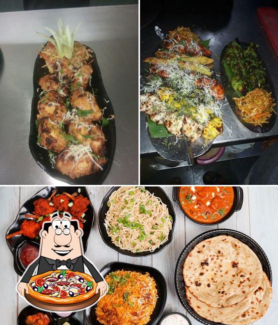 Pick pizza at Dhanraj Kitchen