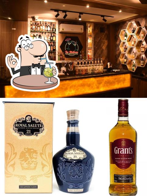 The photo of drink and interior at MIDTOWN FAMILY RESTAURANT & BAR