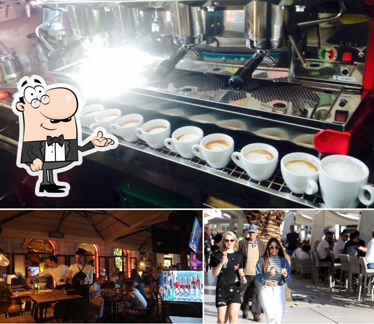 Siediti a un tavolo di Caffe bar Dujam