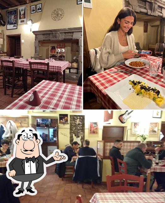 Dai un'occhiata agli interni di Carlito's trattoria con alloggio