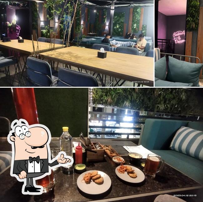 Check out how Kairos Restro Grills Bar : Best Bar Best rooftop restro bar Best restaurant in Ajmer. looks inside