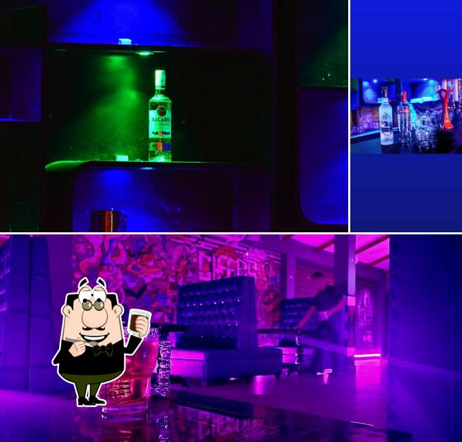 Enjoy a drink at The Other World Bar