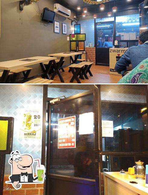 Enjoy a beverage at Zwarma palakkad, sip n crisp