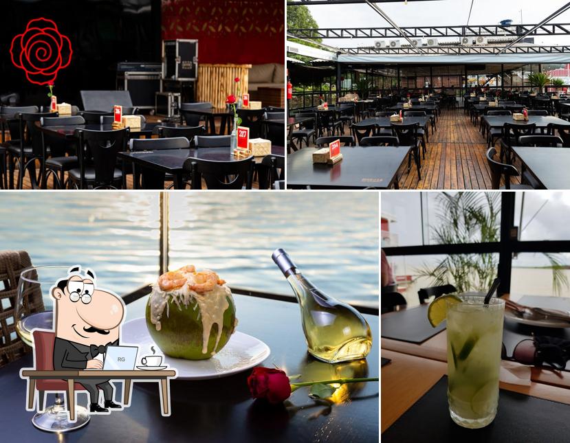 Confira a imagem apresentando interior e bebida no ROSA MADALENA - GASTROBAR NA PRAIA DA GRACIOSA EM PALMAS
