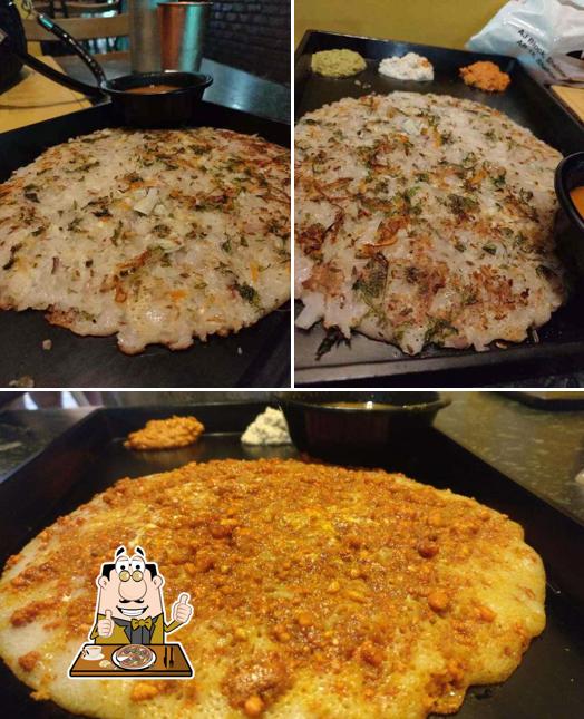 At Carnatic Cafe, you can taste pizza