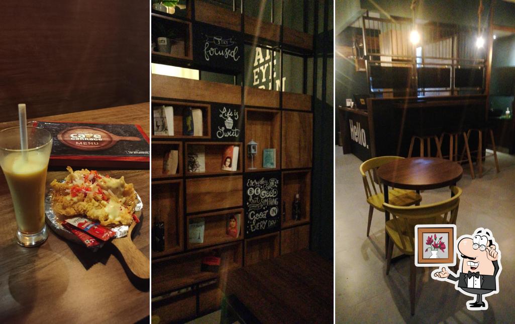 Take a seat at one of the tables at Cafe Garrage (sudden brake for hunger)