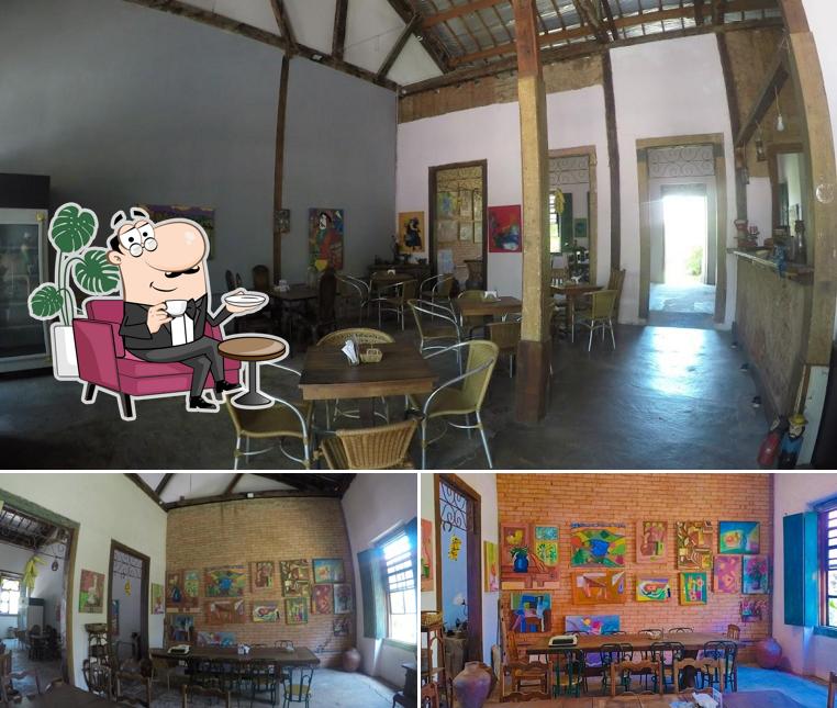 Sente em uma das mesas no A Senzala Doceria - Zala Caffè