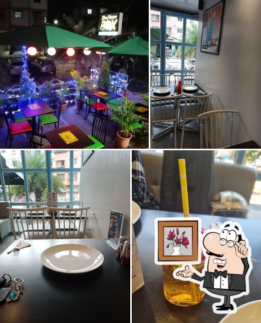 The interior of The Pizza Box & Cafe Sinhagad road Pure Veg