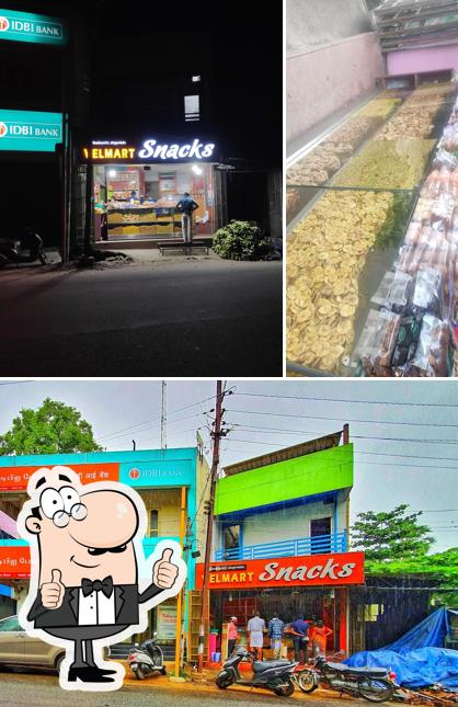 Look at the photo of VELMART SNACKS