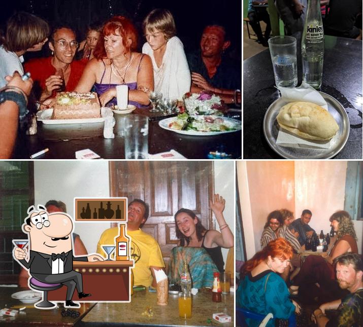 This is the picture displaying bar counter and food at Pinto's Bar