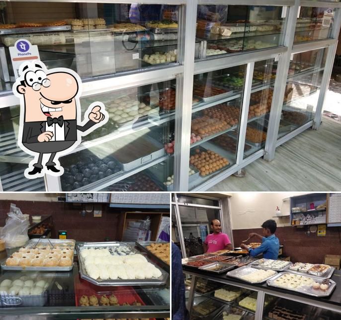 Take a seat at one of the tables at Surjya Kumar Modak