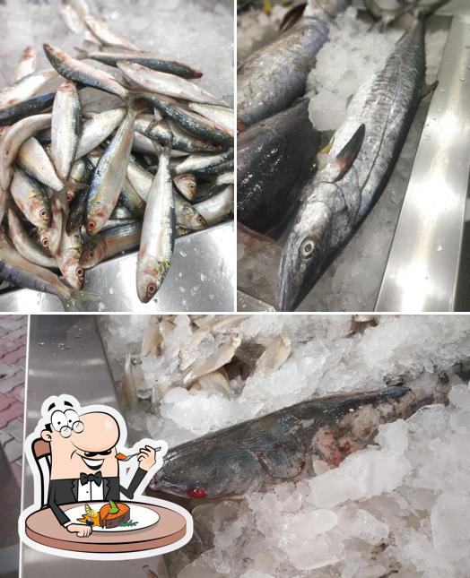 P O KADAPPURAM FISH COMPANY serves a menu for seafood lovers