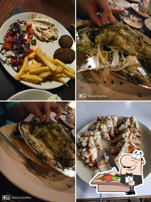 Try out seafood at Oasis Cafe swargashraam ramjhula rishikesh