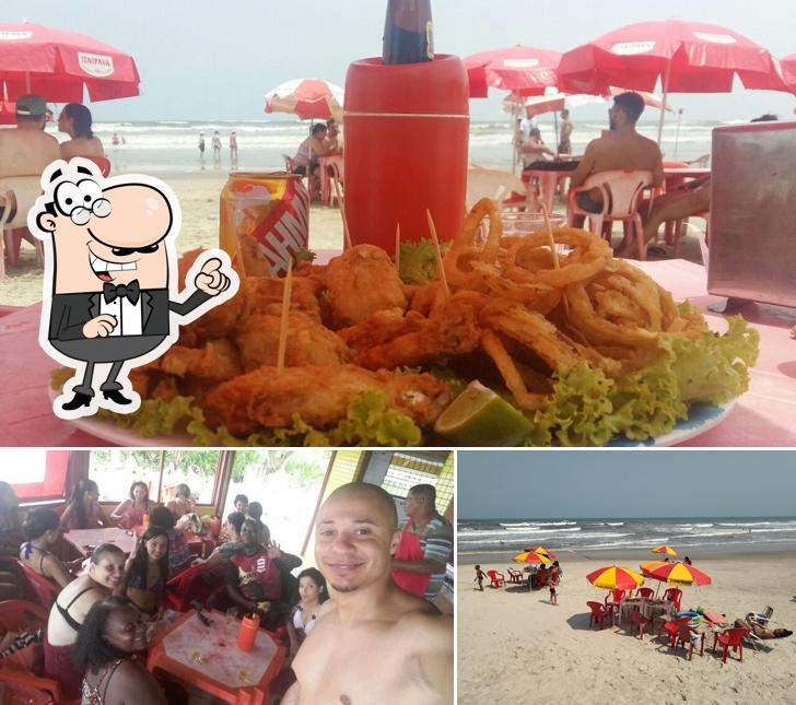 Sente em uma das mesas no Quiosque Ponto Da União