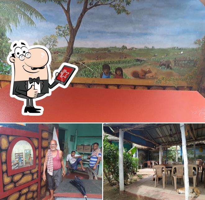 Look at the image of Raju's Restaurant