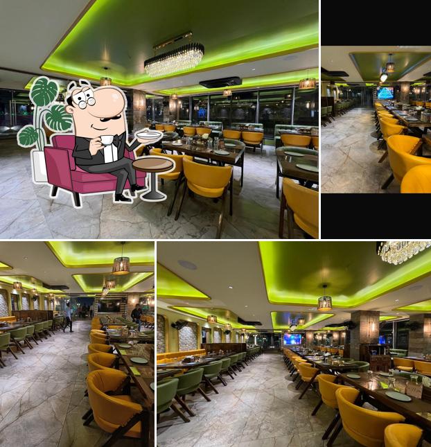 The interior of PUNJABI CHAAP CORNER MULTI CUISINE RESTAURANT 100% VEG [ROOFTOP] - BEST RESTAURANT IN MEHSANA