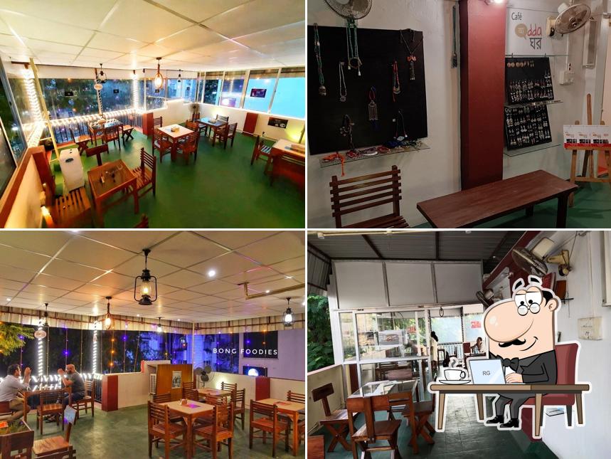 Take a seat at one of the tables at Café Adda Ghor