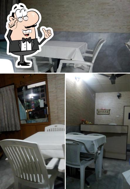 Take a seat at one of the tables at BUSYBITES RESTAURANT