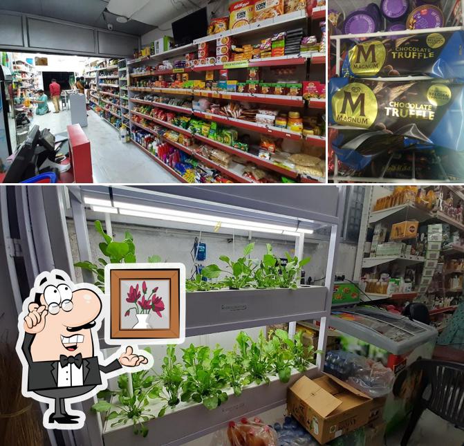 Take a seat at one of the tables at Arya Multi Store