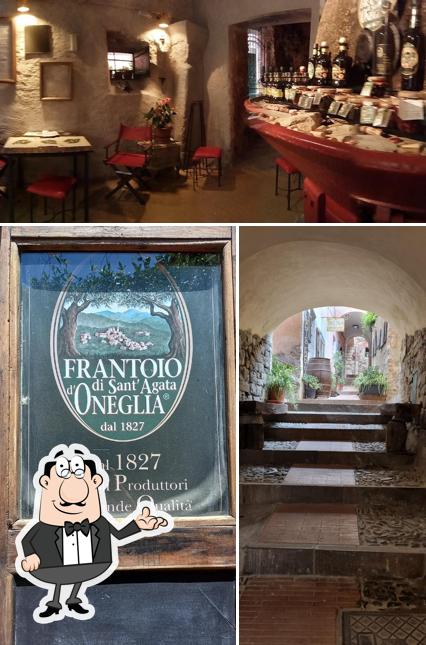 Guarda la immagine che raffigura la interni e cibo di Antico Frantoio Mediterraneo