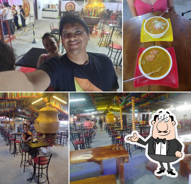 Sente em uma das mesas no Irani e Toinho Self-Service de Caldinhos