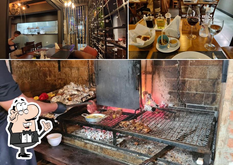 Sente em uma das mesas no Restaurante La Caverna