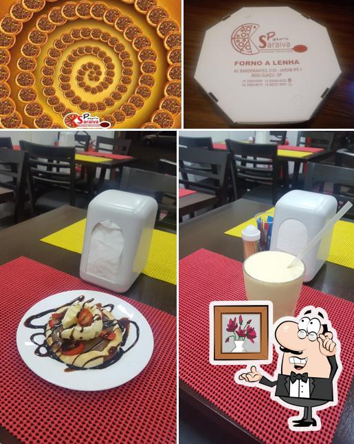 Veja imagens do interior do Pizzaria Saraiva