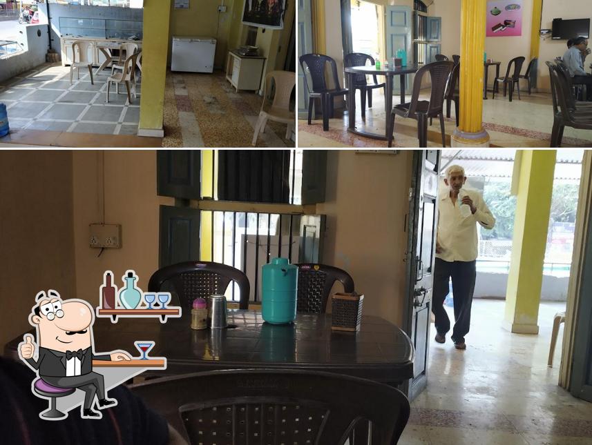 Take a seat at one of the tables at Shree Umiyaji Annapurna Dining hall