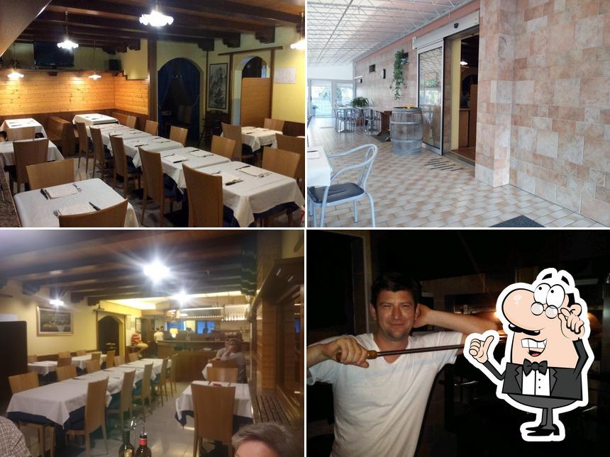 Siediti a un tavolo di Pizzeria Trattoria Al Parini