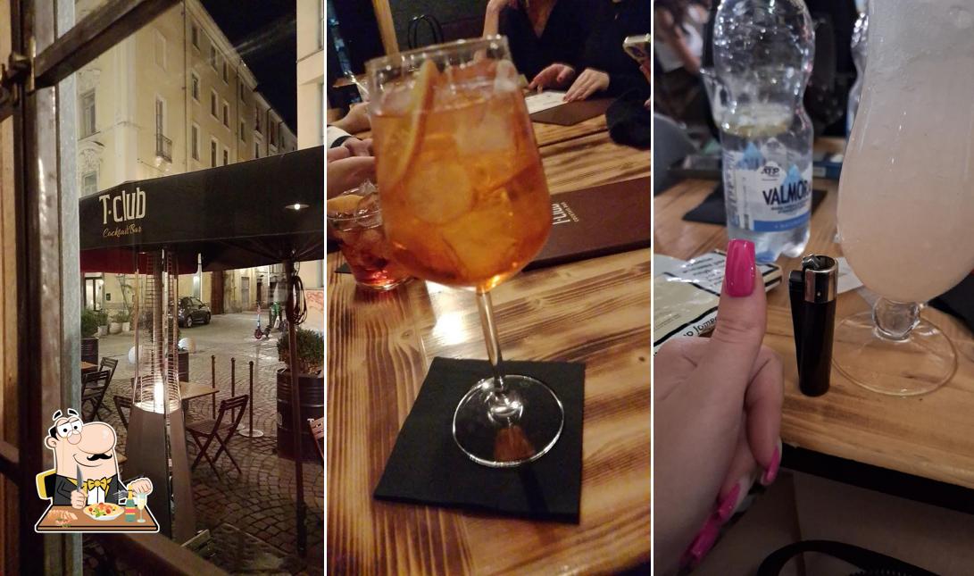 Tra le diverse cose da T·Club Cocktail Bar si possono trovare la cibo e interni