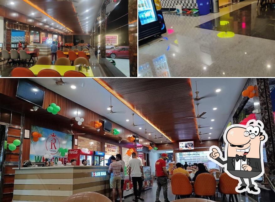 Take a seat at one of the tables at Rasoi Dhaba Raiwala