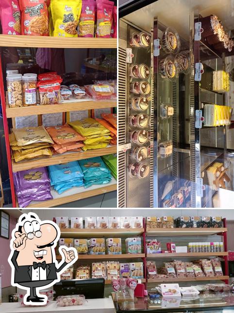 Take a seat at one of the tables at Atul Bakery Sadhu Vasvani Road, Rajkot