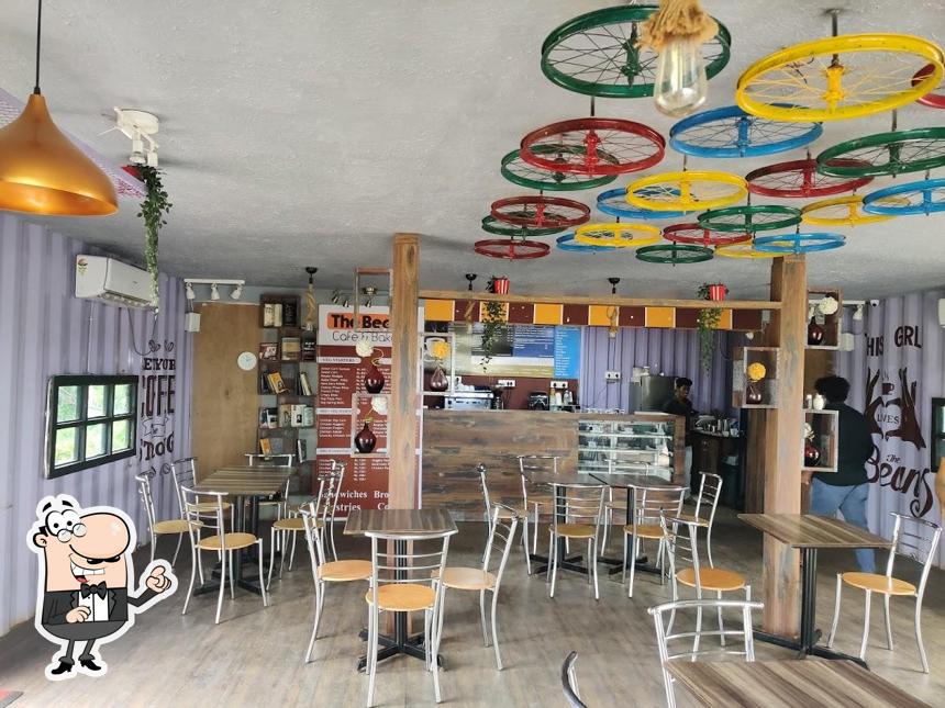 Take a seat at one of the tables at The Beans Cafe and Bakery