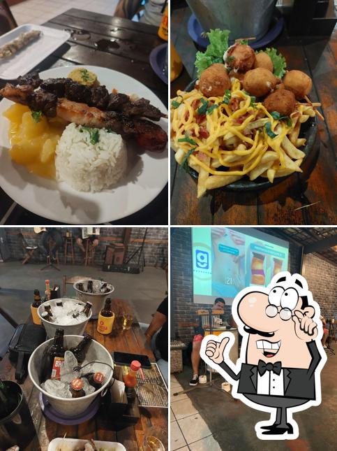 Esta é a foto apresentando interior e comida no Juliu's Churrasquinho