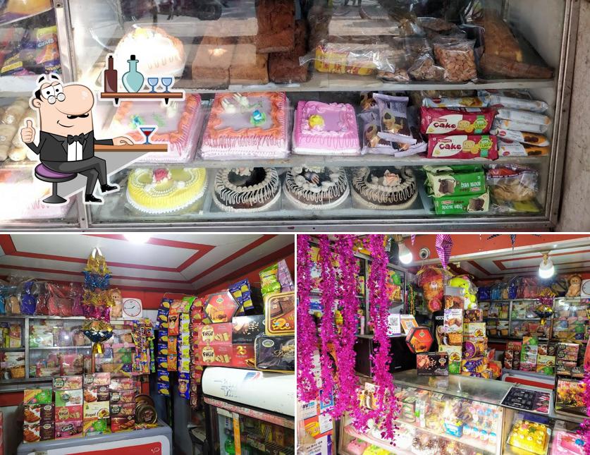 The image of interior and food at Swad Sweets & Snacks Corner